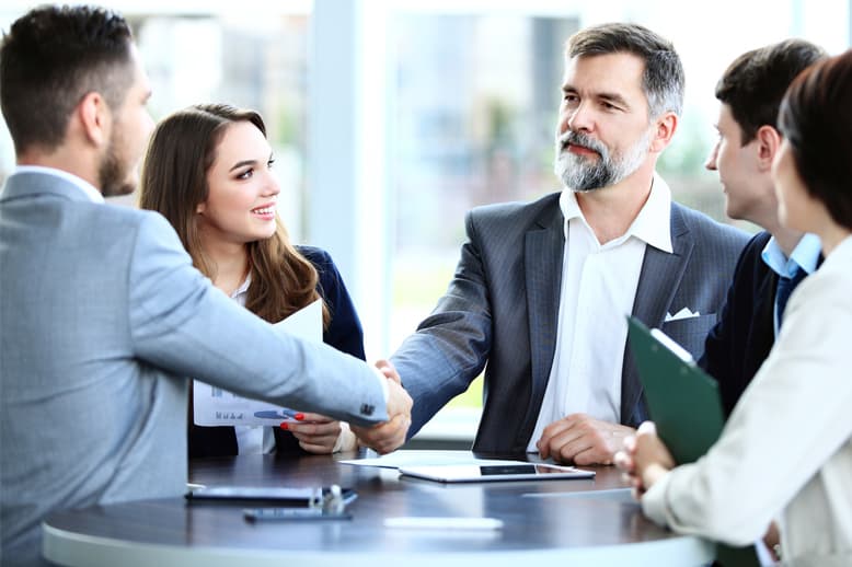 Global professionals collaborating across boundaries